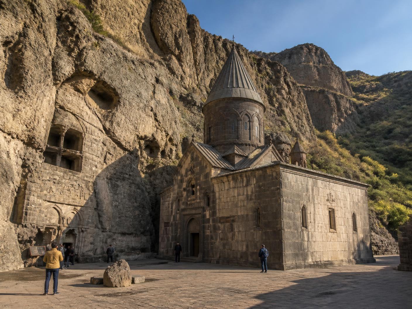 Geghard Monastery surrounded by the rocky Armenian landscape
